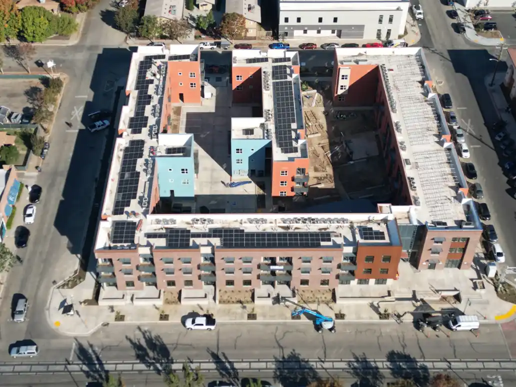 An aerial view of a building with many windows.