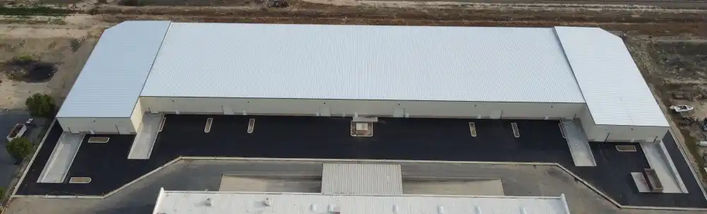 A white box sitting on top of a building.